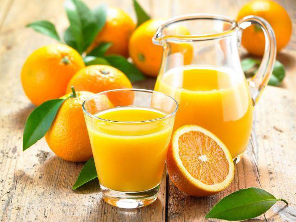 Cung cấp kali, vitamin C và axit folic từ nước cam